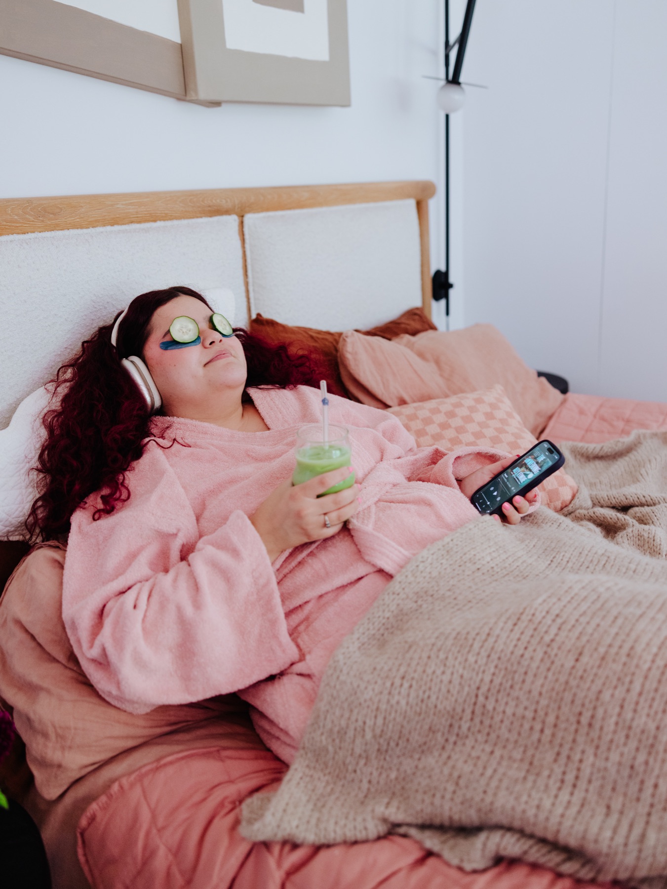 A reader listening to Apple Books while relaxing at home