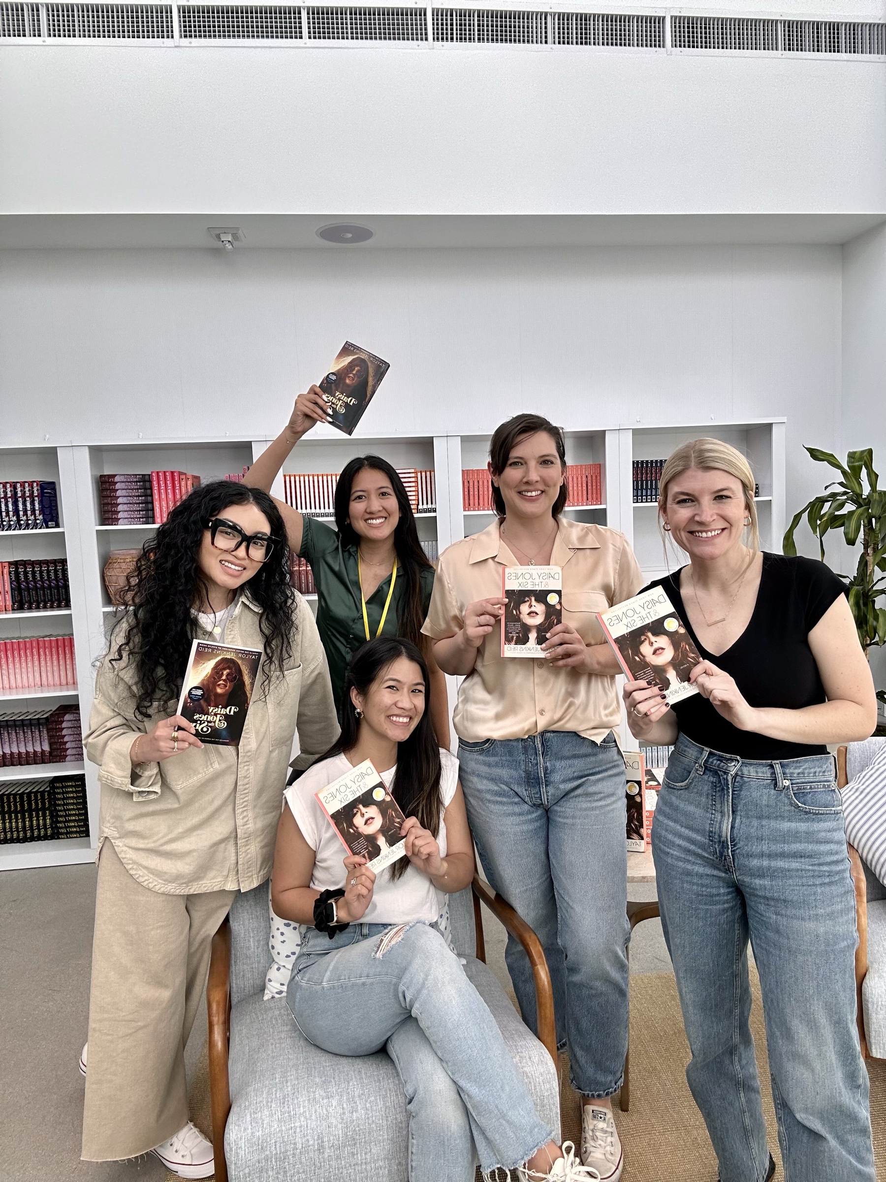 The team gathers at the Hello Sunshine office after filming with Taylor Jenkins Reid.