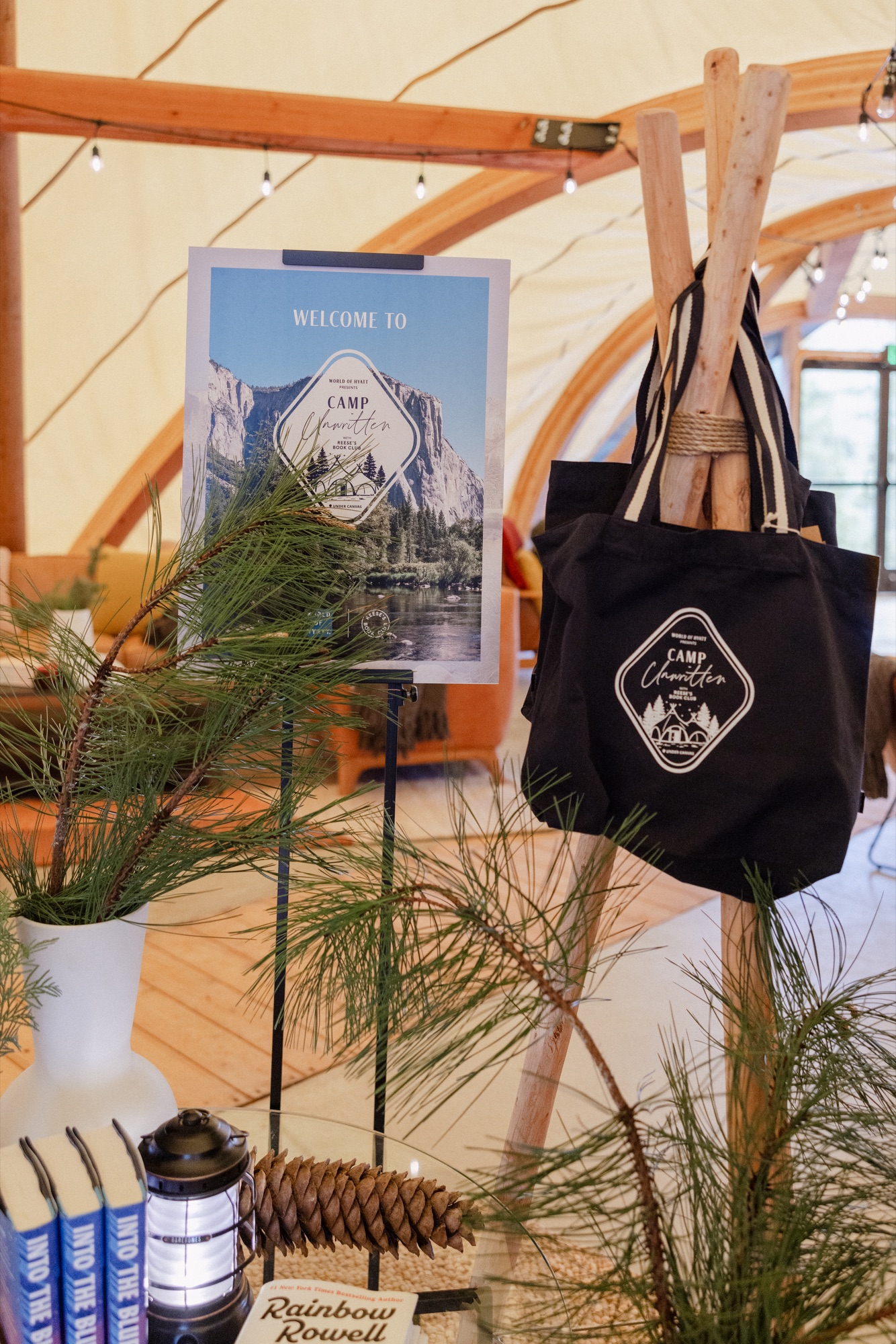 Camp Unwritten Yosemite welcome sign and tote