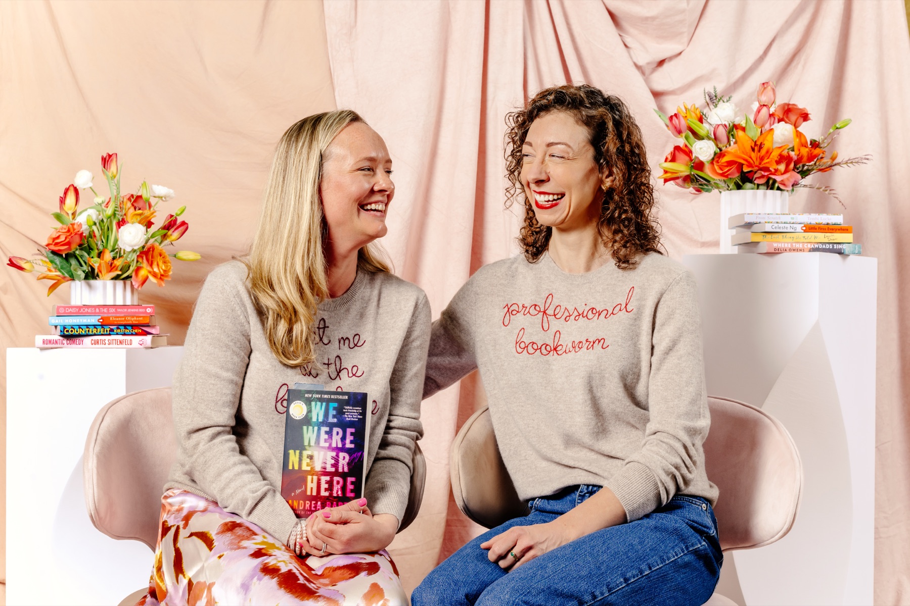 Two readers smiling together at the Plot Twist experience