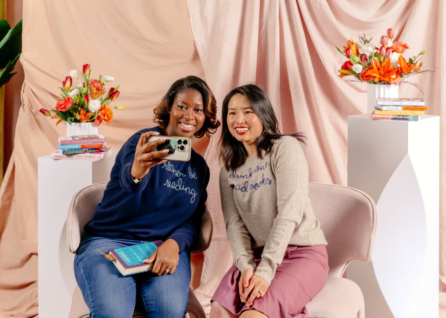 Two readers taking a selfie together at the Plot Twist experience